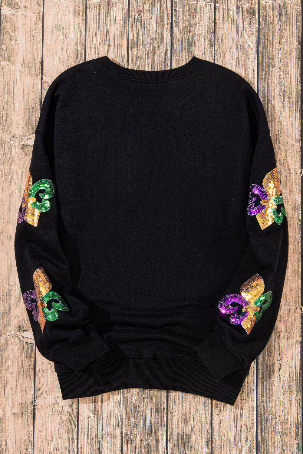 Schwarzes Pullover-Sweatshirt mit Mardi Gras-Grafik und Pailletten