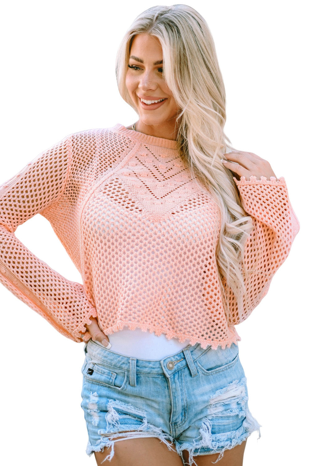 Rosa Strickpullover mit Glockenärmeln und Ösen