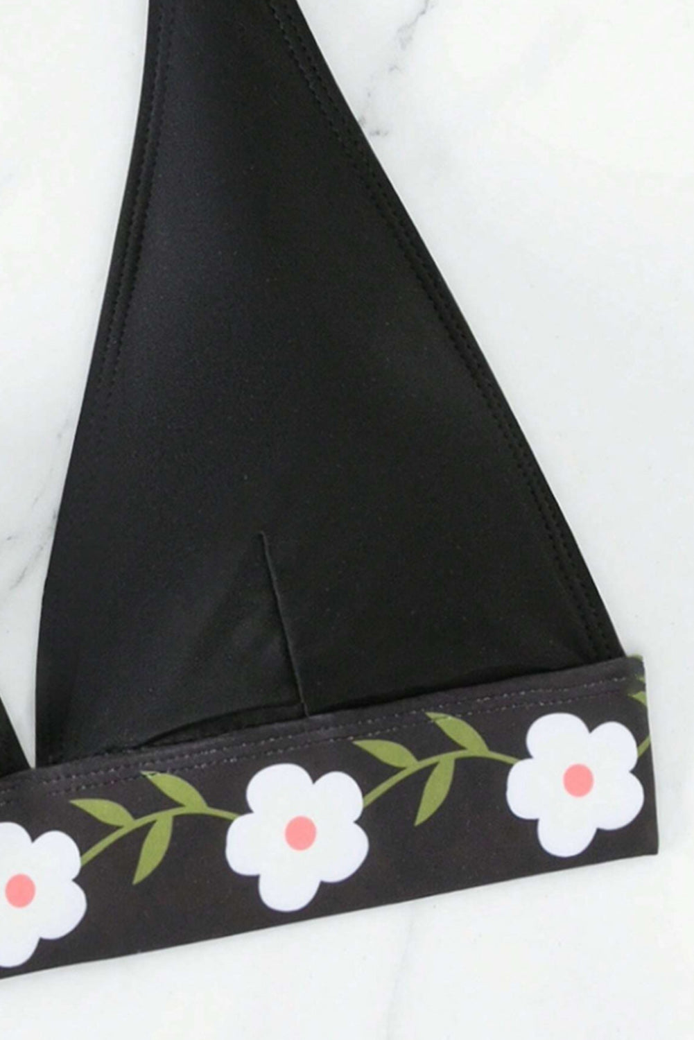 Schwarzer Neckholder-Badeanzug mit Blumenmuster und hoher Taille