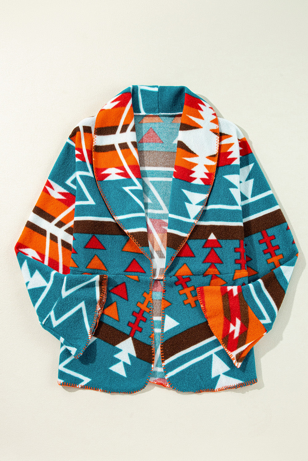 Himmelblaue Jacke mit Revers und Glockenärmeln im Azteken-Print