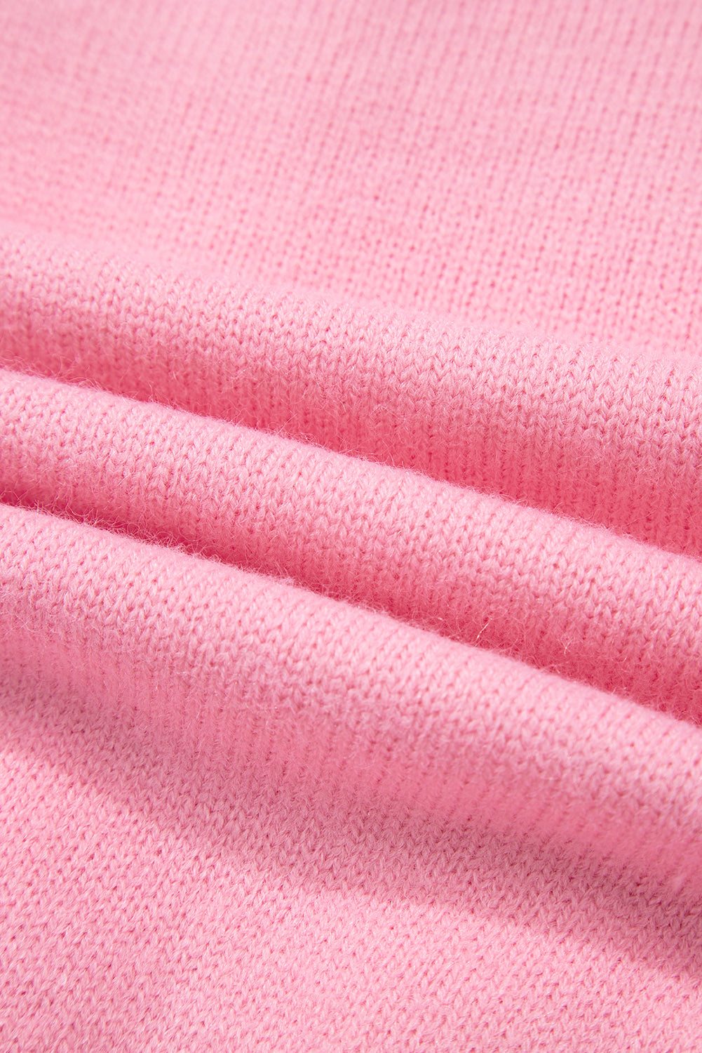 Niedliche Strickjacke mit Blumenmuster in Rosa