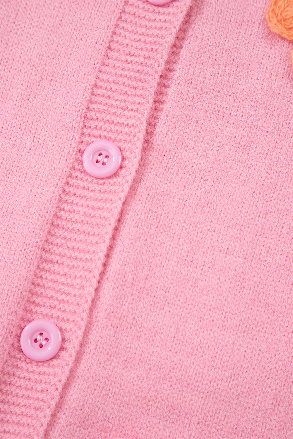Niedliche Strickjacke mit Blumenmuster in Rosa
