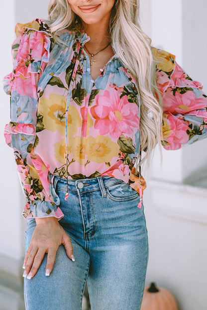 Rosa Bluse mit Blumenmuster und Rüschen