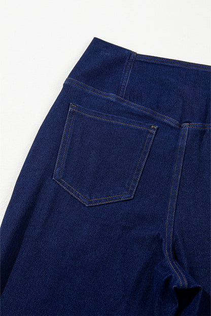 Dunkelblaue, einfarbige Schlagjeans mit gekreuzter High Waist