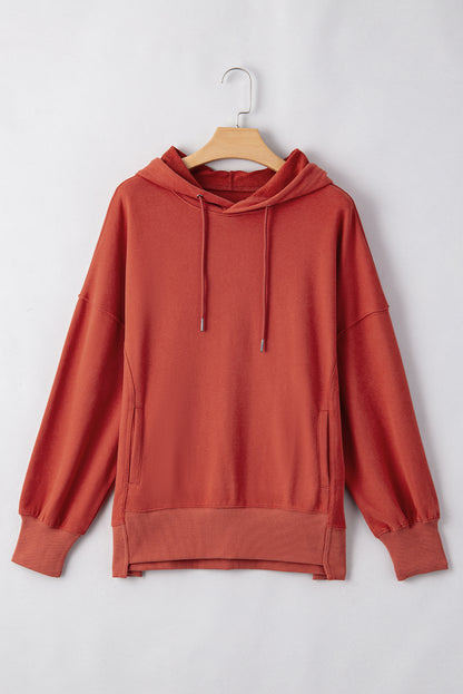 Red Clay – Weite Kapuzenjacke mit überschnittener Schulterpartie und Taschen