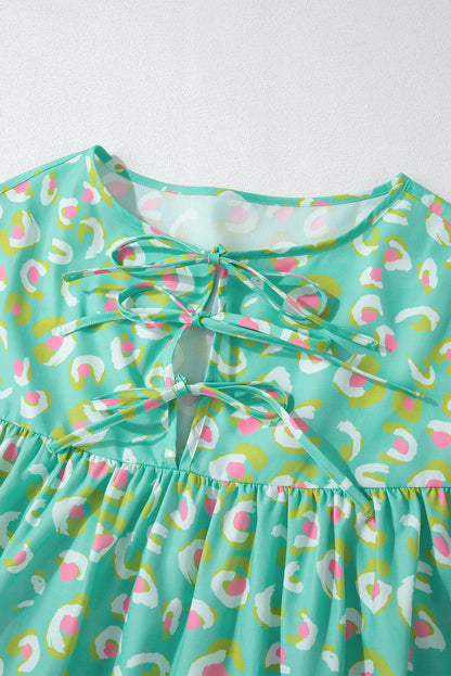 Grüne Babydoll-Bluse mit abstraktem Print und Schnürung und Laternenärmeln