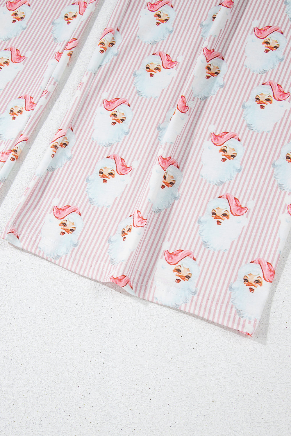 Rosa, locker geschnittenes, zweiteiliges Lounge-Set mit gestreiftem Weihnachtsmann-Print