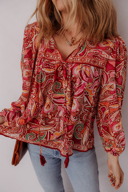 Mehrfarbige Boho-Bluse mit ethnischem Paisley-Print, Quaste und Puffärmeln