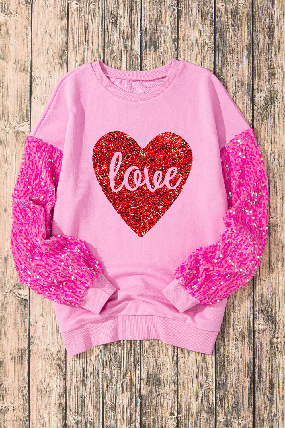 Rosa Sweatshirt mit glänzendem Herz-Print und Paillettenärmeln