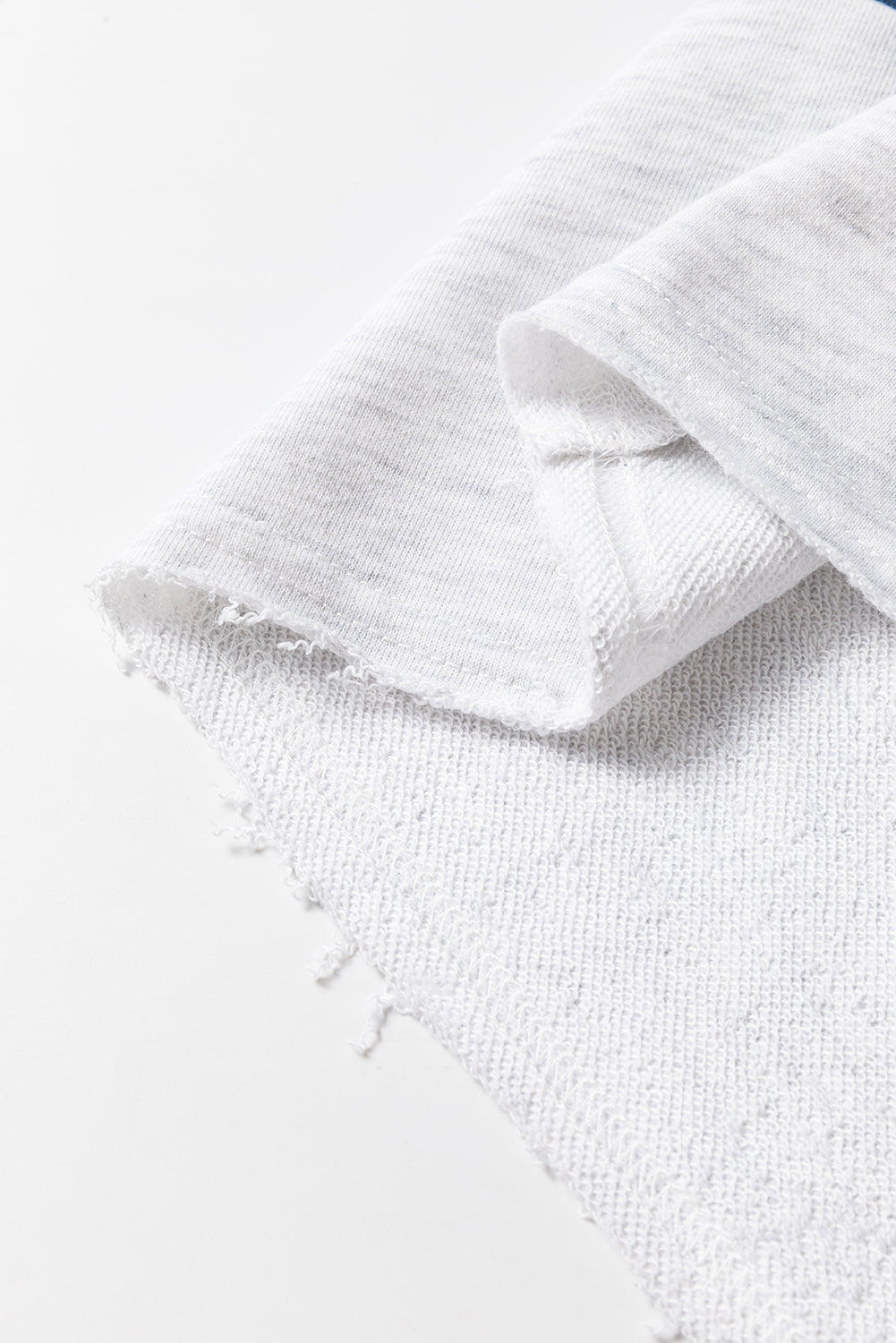 Segelblaues Sweatshirt mit Farbblock-Streifen und Patchwork-Rohnähten