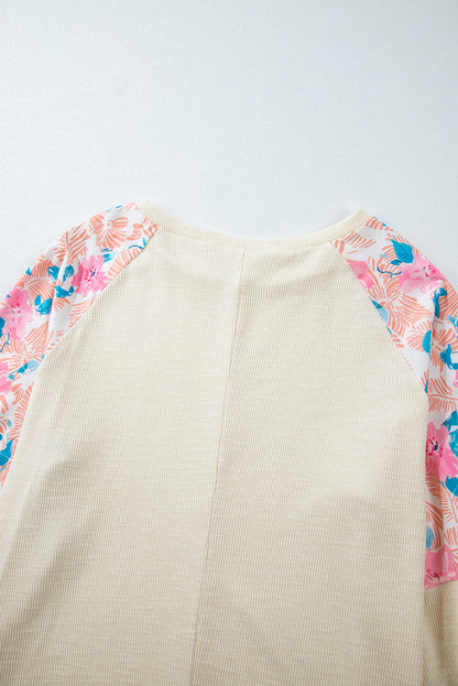 Apricot – Geripptes Oberteil mit Blumen-Patchwork und Puffärmeln in Übergröße