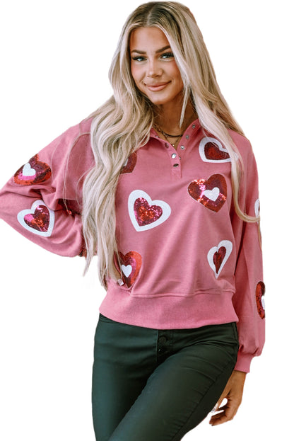 Rosa Sweatshirt mit Pailletten und Herz-Druckknöpfen in Mineralwaschung und Kragen