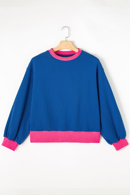 Blaues Sweatshirt mit Farbblock-Muster und Puffärmeln