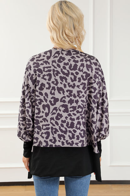 Schwarzes Sweatshirt mit Leoparden-Patchwork und Schlitzen im Bischofsärmel-Stil