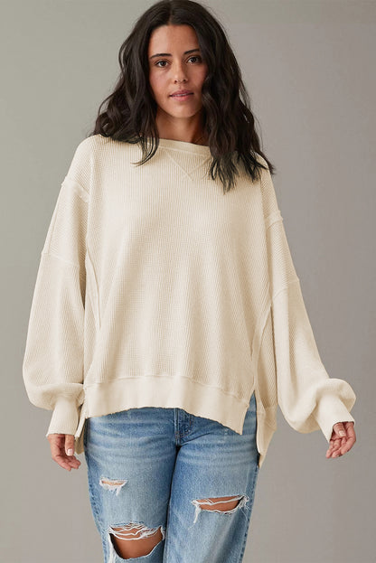 Weißes Oversize-Sweatshirt mit Waffelstrick und Bischofsärmeln
