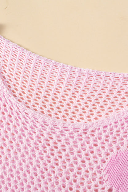 Hellrosa Strickpullover mit großer Blume und tief angesetzter Schulterpartie