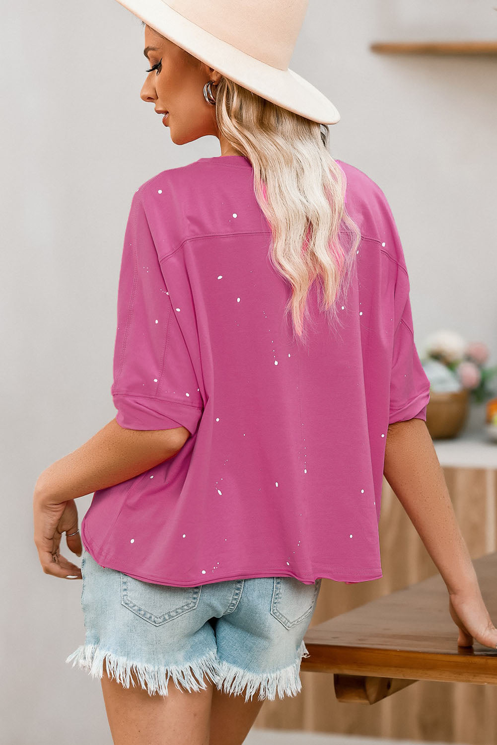 Rosa, gebleichtes Top mit asymmetrischem Saum im Used-Look und kurzen Ärmeln