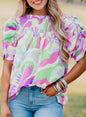 Grüne Bluse mit abstraktem Print und Puffärmeln