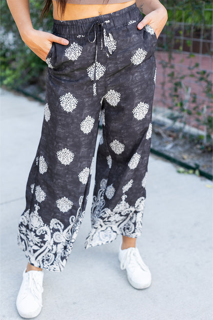 Schwarze Hose mit weitem Bein und Bohemien-Print