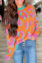 Orangefarbener Pullover mit Leopardenmuster und geripptem Rand im Colorblock-Design