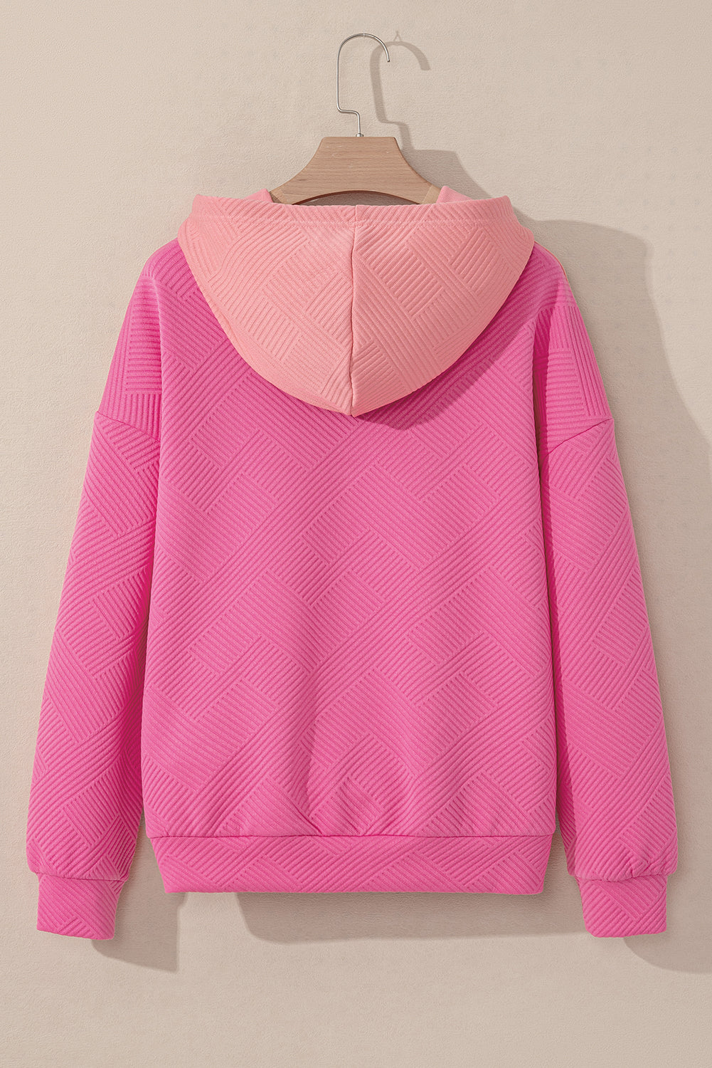 Rosafarbener Hoodie mit strukturiertem Farbblockdesign und Kängurutasche und überschnittener Schulter