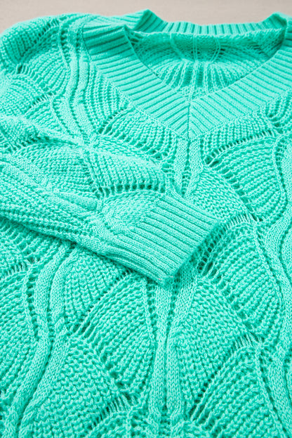 Mintgrüner Strickpullover mit V-Ausschnitt und überschnittenen Schultern