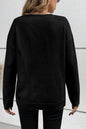 Schwarzer Pullover mit überschnittener Schulter und geripptem Rand und Boo-Strickmuster