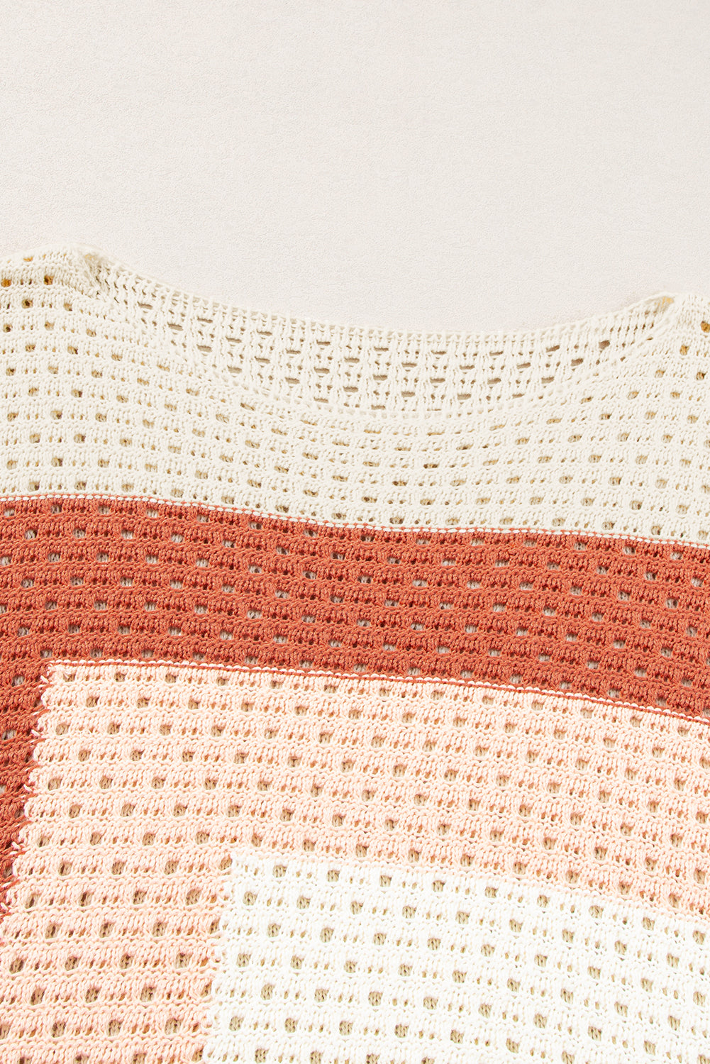 Aprikosenfarbener Pointelle-Strick-Baggy-Pullover mit Farbblockdesign