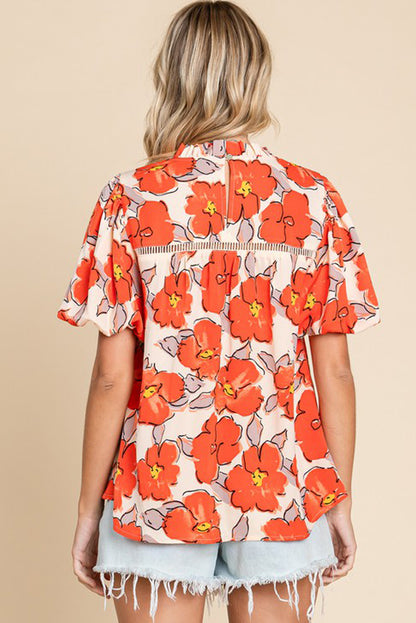 Orangefarbene Bluse mit Blumenmuster, Puffärmeln und Rüschenkragen