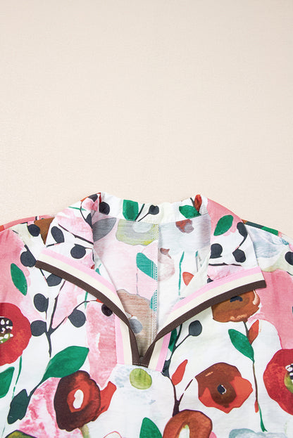 Rosa Bluse mit Blumenmuster und Schlitz und V-Ausschnitt, kurzärmlig