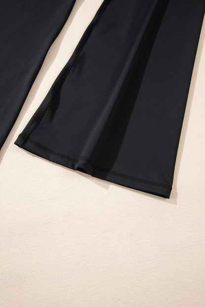 Schwarze, ausgestellte Leggings in V-Form mit hoher Taille