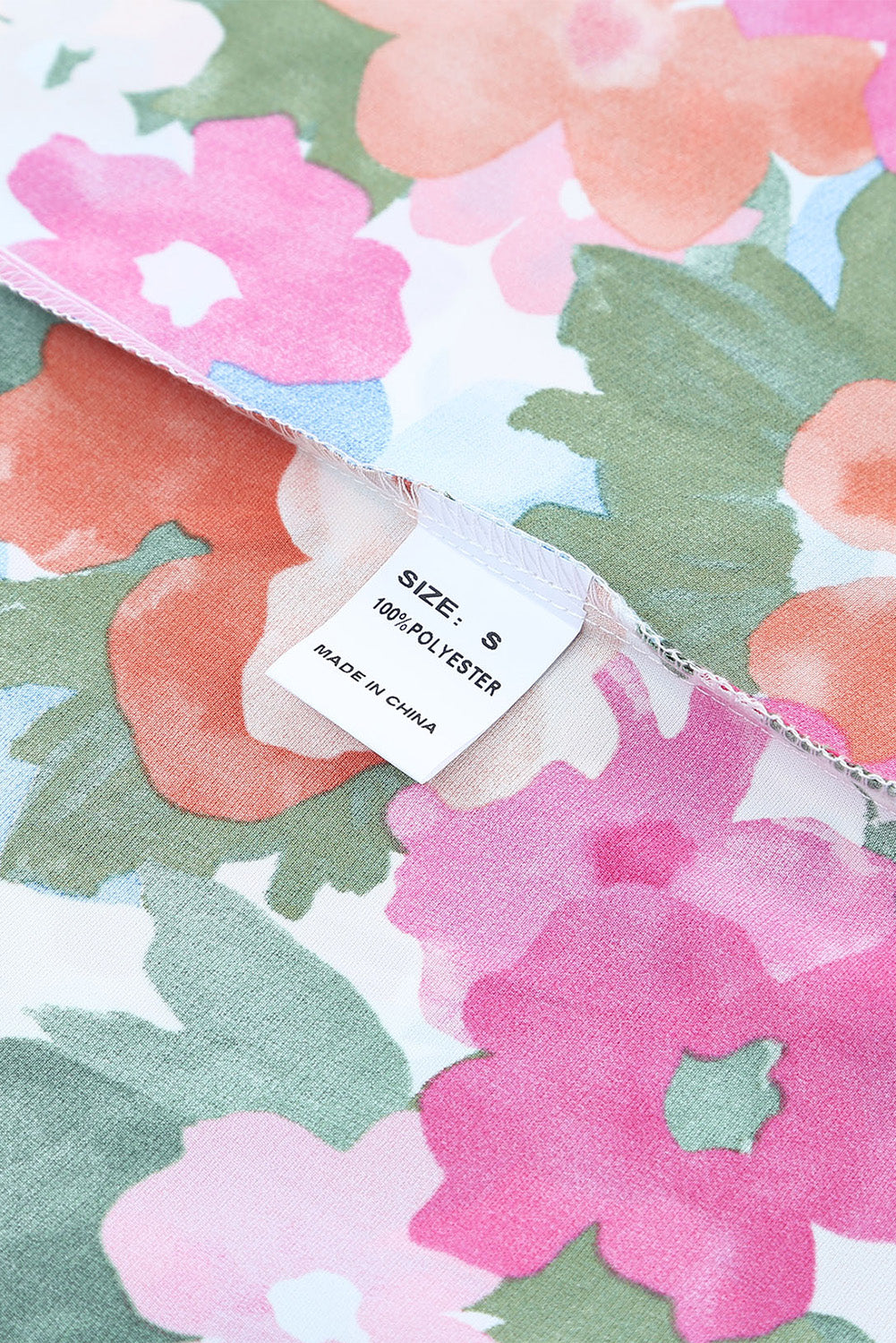 Schulterfreie Bluse mit Blumenmuster und Rüschen