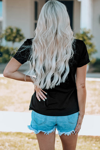 Schwarzes MERRY and BRIGHT T-Shirt mit Rundhalsausschnitt und Grafik