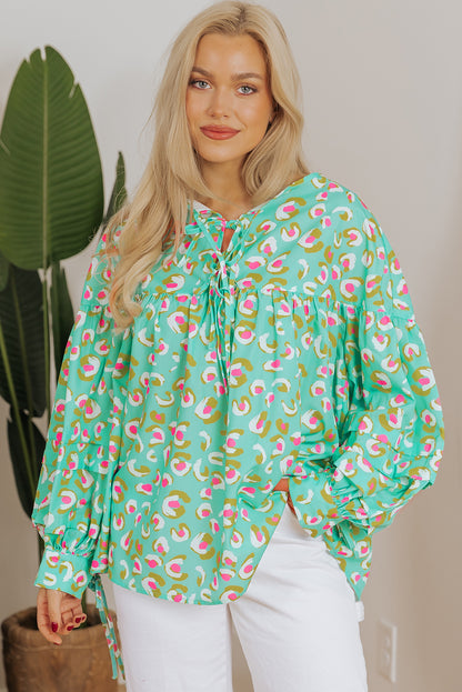 Grüne Babydoll-Bluse mit abstraktem Print und Schnürung und Laternenärmeln