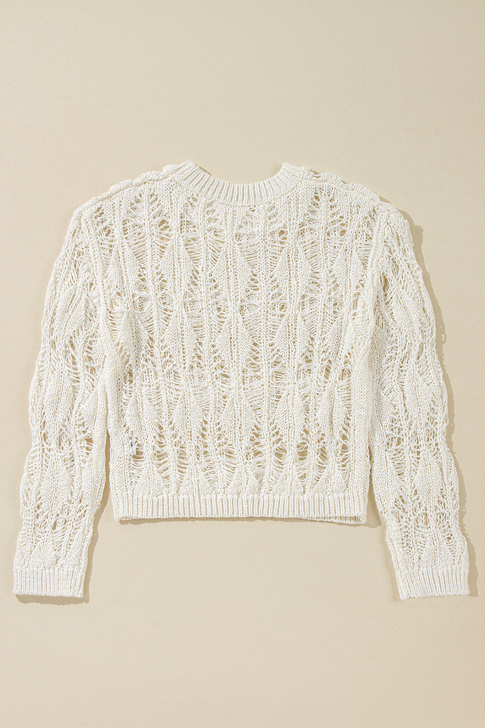 Weißer, locker sitzender Pullover mit Rundhalsausschnitt und Häkelmuster