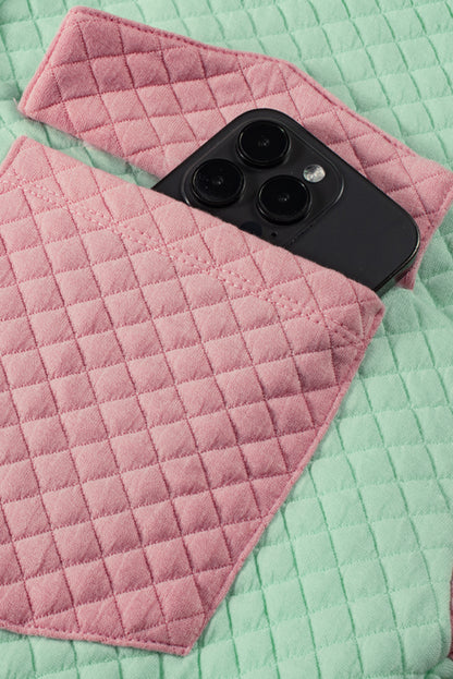 Grüne Steppjacke mit Patchwork-Patchwork-Klappentasche und Farbblock