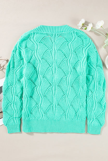 Mintgrüner Strickpullover mit V-Ausschnitt und überschnittenen Schultern