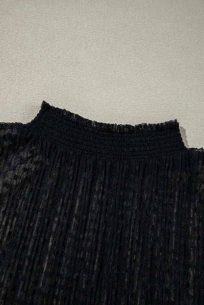 Schwarze Bluse mit transparenter Spitze und Stehkragen und langen Ärmeln