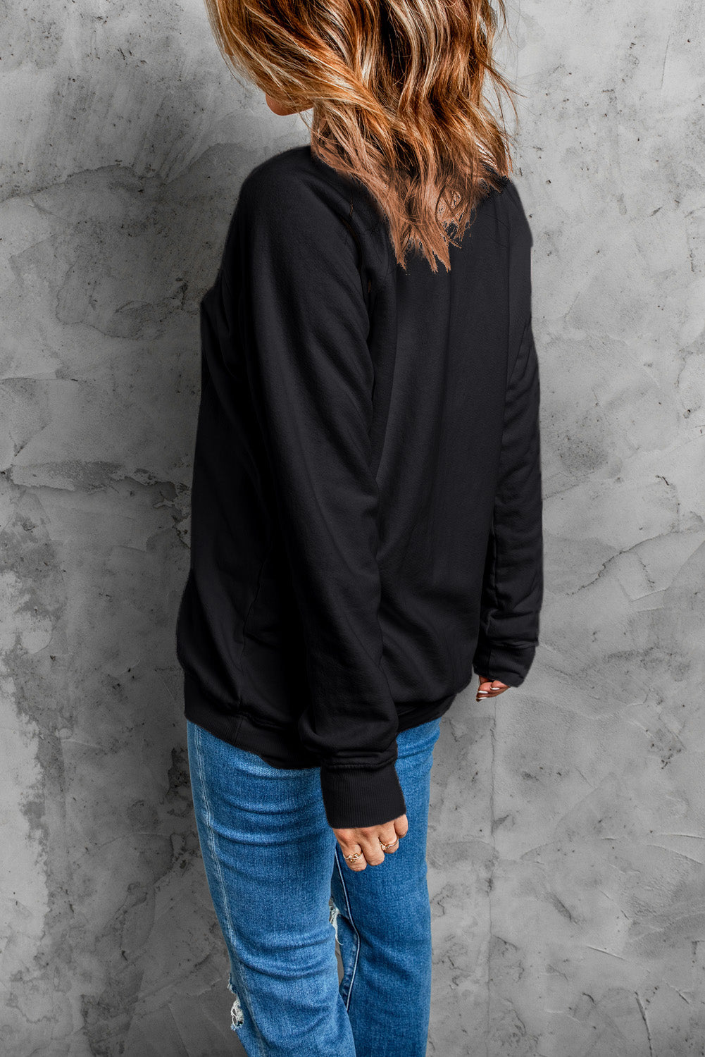 Schwarzes Sweatshirt mit Grusel-Saison-Geistergrafik