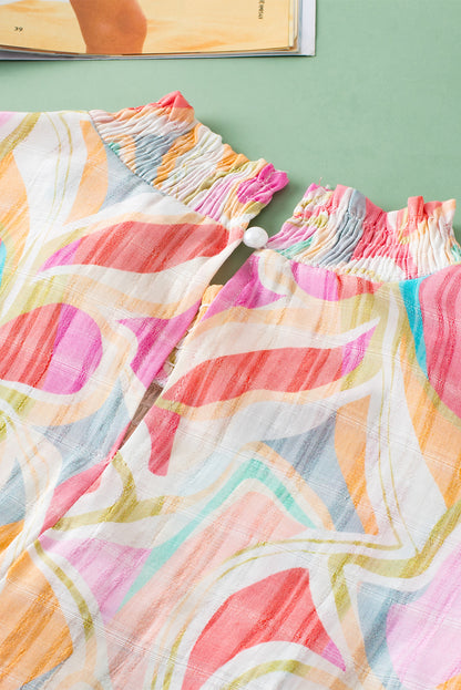 Gelbe Bluse mit abstraktem Print, gesmoktem Kragen und Rüschenärmeln