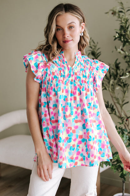 Himmelblaue Bluse mit geraffter Passe und abstraktem Print