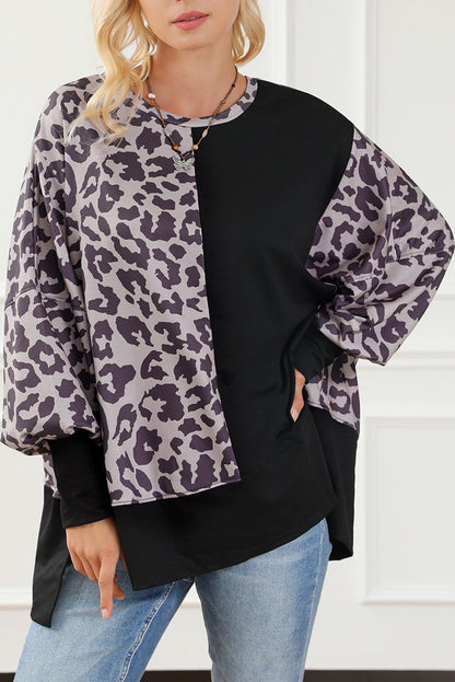 Schwarzes Sweatshirt mit Leoparden-Patchwork und Schlitzen im Bischofsärmel-Stil