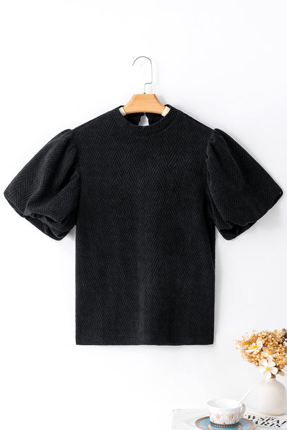 Schwarze Bluse mit Stehkragen und Puffärmeln