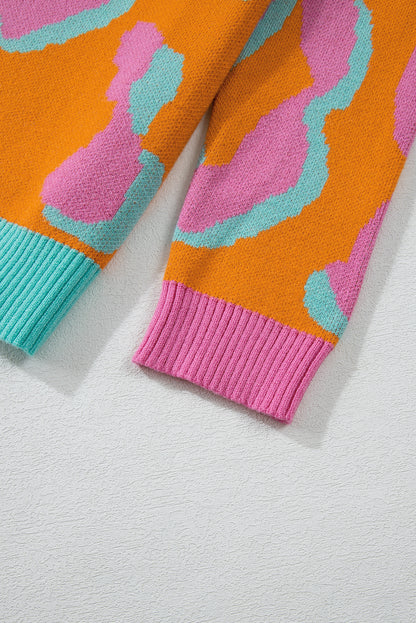 Orangefarbener Pullover mit Leopardenmuster und geripptem Rand im Colorblock-Design