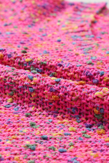 Dunkelrosa bunt gepunkteter Strickpullover mit V-Ausschnitt