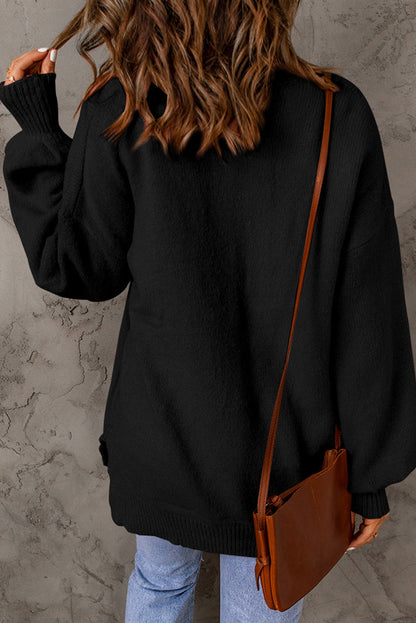 Schwarzer, einfarbiger Pullover mit Puffärmeln und Taschen