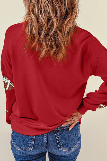 Feuerrotes Sweatshirt mit überschnittener Schulter und Rugby-Grafik