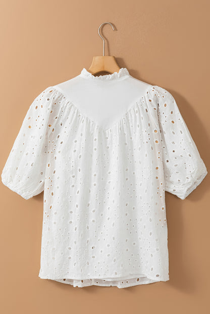 Weiße Bluse mit Blumenstickerei und Puffärmeln