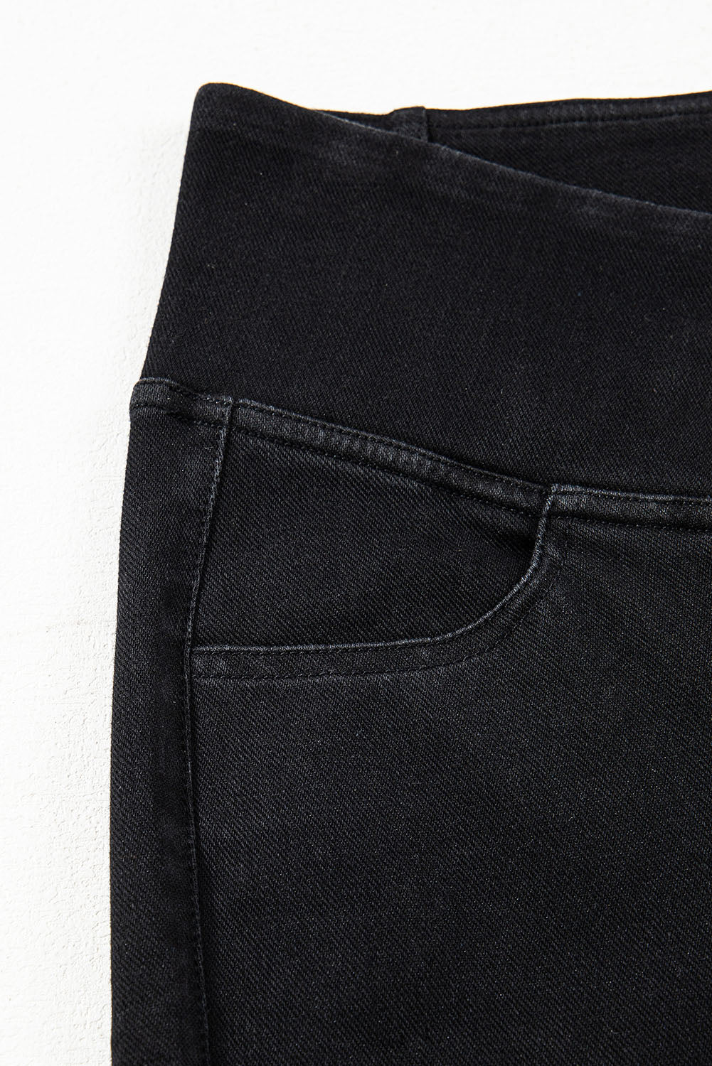 Schwarze, dehnbare Jeggings mit gewölbter Taille und schmaler Passform