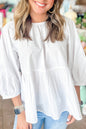 Weiße Bluse mit 3/4-Ärmeln und Schleife und Cut-Out auf der Rückseite